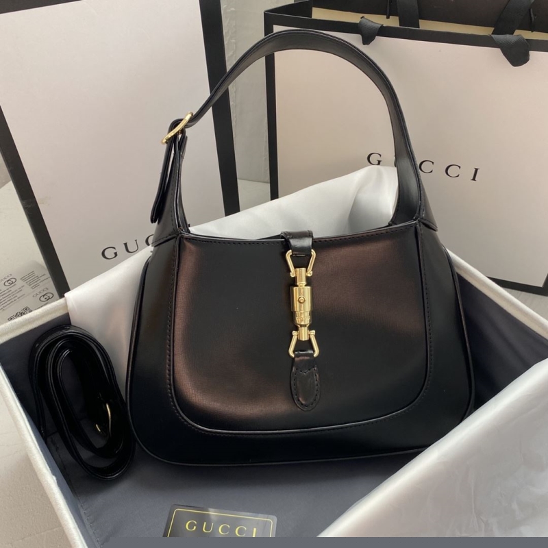 G*u*i top handle bags